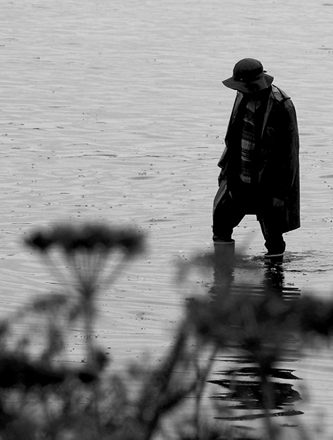 Man Wading in Water